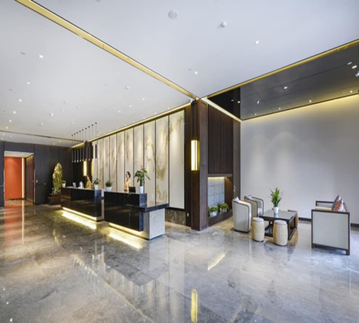 Imagen de los interiores del Hotel Zhuji Grand. Foto 19