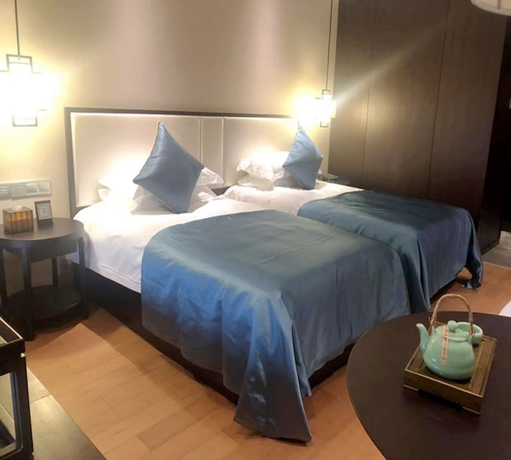 Imagen de la habitación del Hotel Zhuji Grand. Foto 6