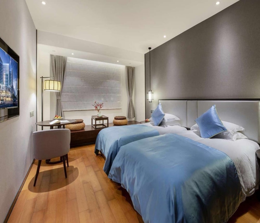 Imagen de la habitación del Hotel Zhuji Grand. Foto 7