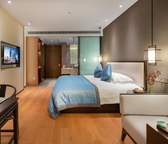 Imagen de la habitación del Hotel Zhuji Grand. Foto 17