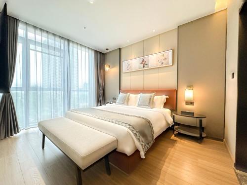 Imagen de la habitación del Hotel Zhuo Ruiyunrui. Foto 19