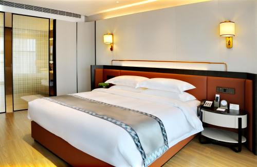 Imagen de la habitación del Hotel Zhuo Ruiyunrui. Foto 20