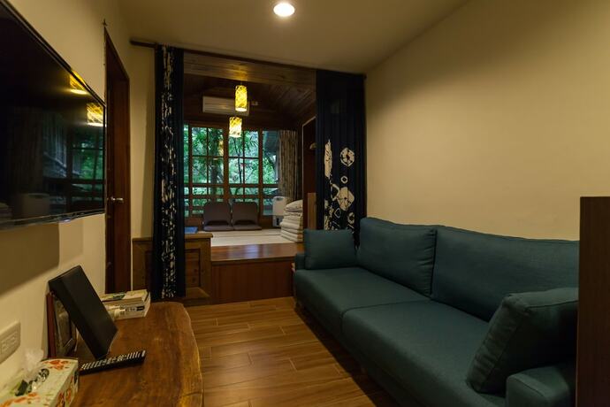 Imagen de la habitación del Hotel Zhuo Ye Cottage. Foto 14