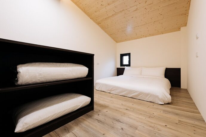 Imagen de la habitación del Hotel Zhuo Ye Cottage. Foto 17