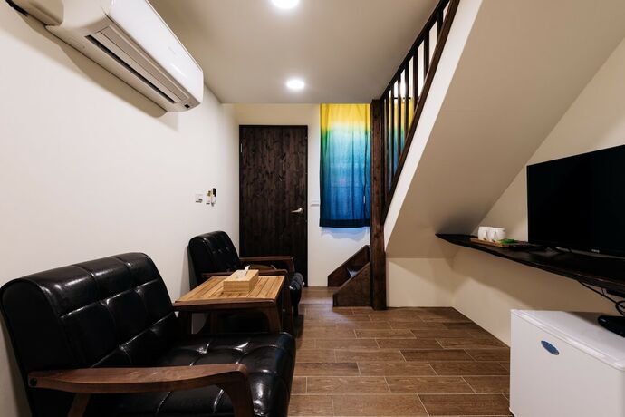 Imagen de la habitación del Hotel Zhuo Ye Cottage. Foto 19