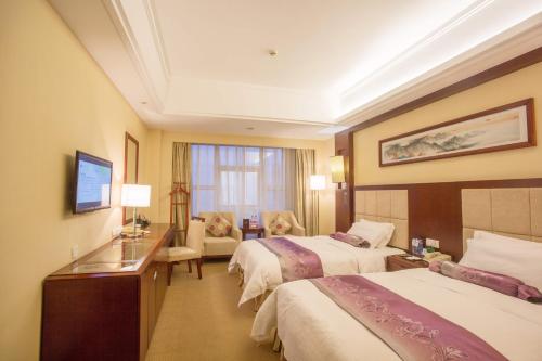 Imagen de la habitación del Hotel Zhuzhou Hua Tian. Foto 6