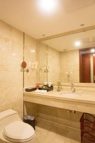 Imagen de la habitación del Hotel Zhuzhou Hua Tian. Foto 7