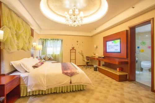 Imagen de la habitación del Hotel Zhuzhou Hua Tian. Foto 8