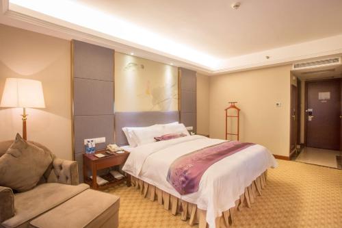 Imagen de la habitación del Hotel Zhuzhou Hua Tian. Foto 9