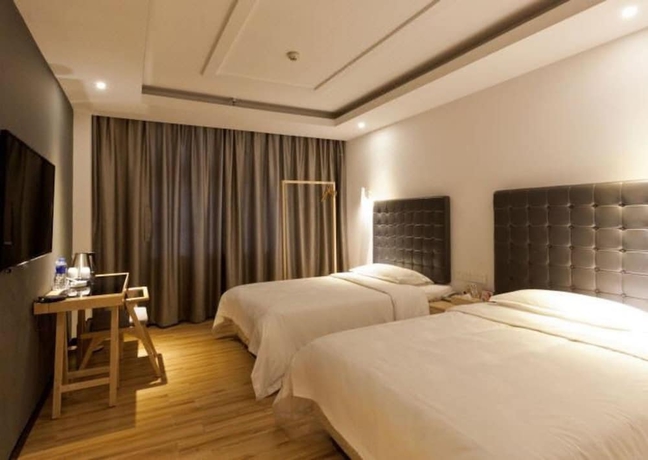 Imagen de la habitación del Hotel Zhuzhou Jinjin Haiyue. Foto 9