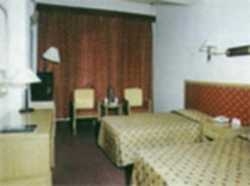 Imagen de la habitación del Hotel Zi Long. Foto 2
