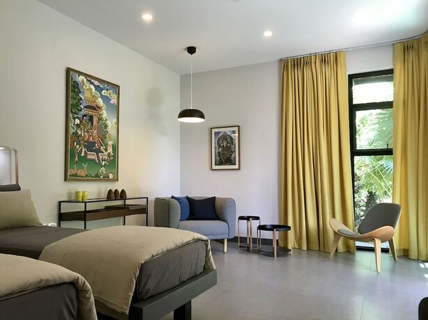 Imagen de la habitación del Hotel ZiZ Boutique House. Foto 12