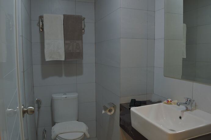 Imagen de la habitación del Hotel Zia Sanno Menteng Residences Jakarta. Foto 8