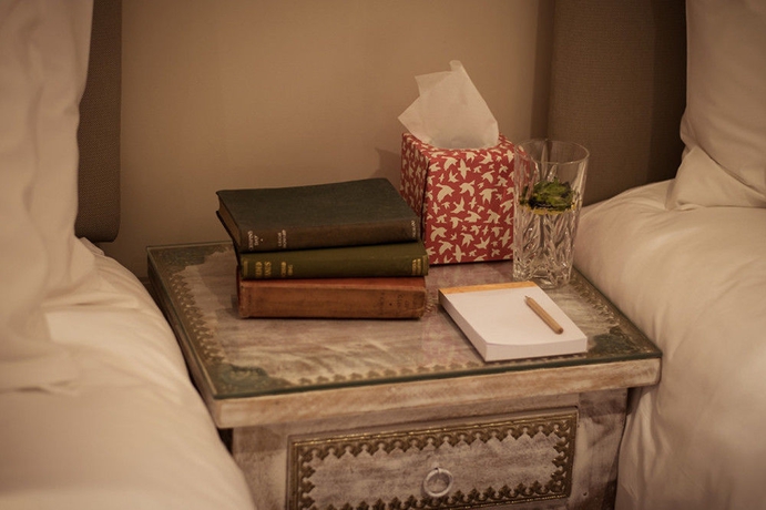Imagen de la habitación del Hotel Ziggurat. Foto 5