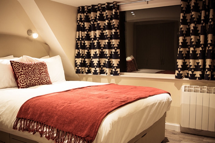 Imagen de la habitación del Hotel Ziggurat. Foto 8