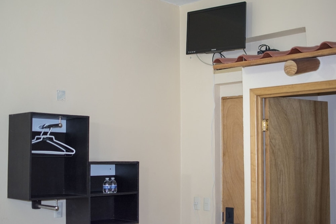 Imagen de la habitación del Hotel Zihua Express. Foto 13