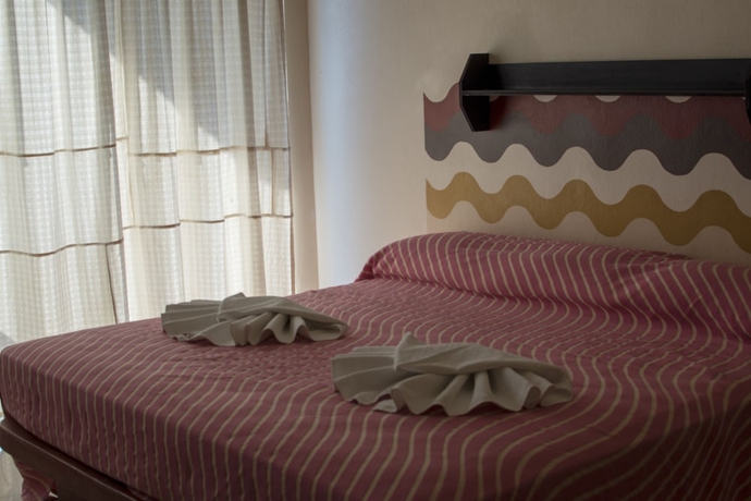 Imagen de la habitación del Hotel Zihua Express. Foto 14