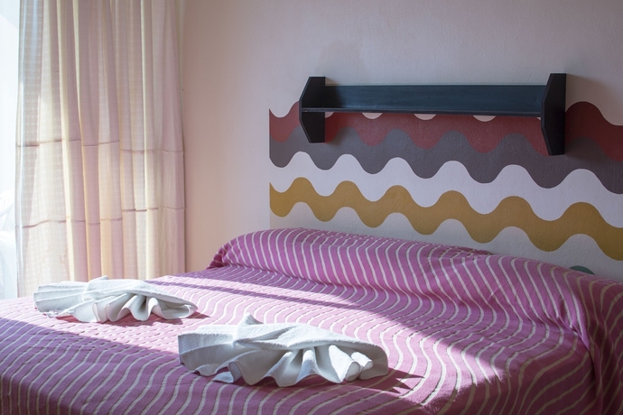 Imagen de la habitación del Hotel Zihua Express. Foto 18