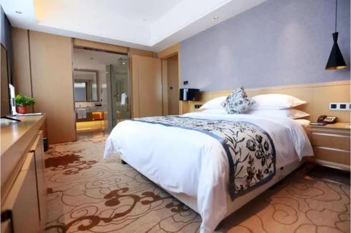 Imagen de la habitación del Hotel Zijing International. Foto 9