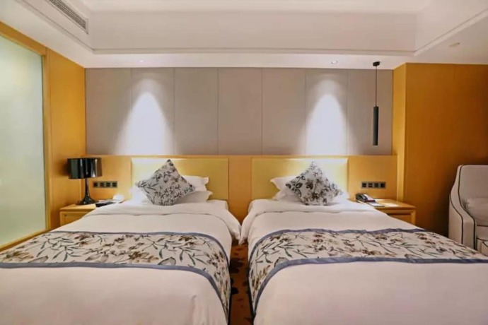 Imagen de la habitación del Hotel Zijing International. Foto 11