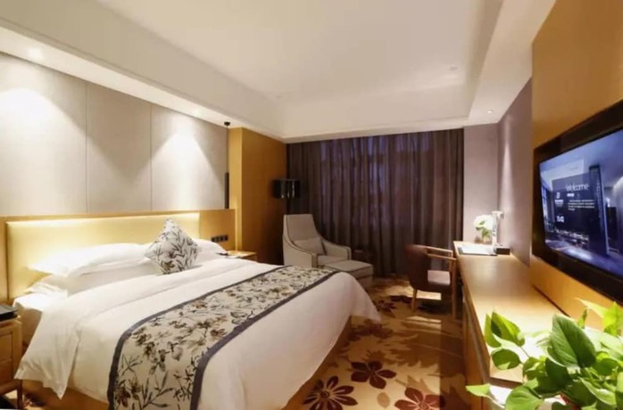 Imagen de la habitación del Hotel Zijing International. Foto 15