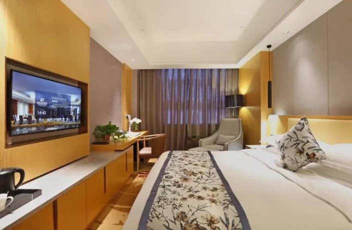 Imagen de la habitación del Hotel Zijing International. Foto 17