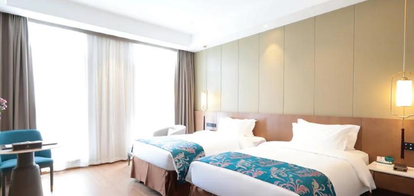 Imagen de la habitación del Hotel Zijing International Hotel. Foto 12