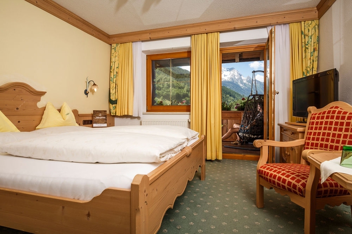 Imagen de la habitación del Hotel Zillergrundrock Luxury Mountain Resort. Foto 8