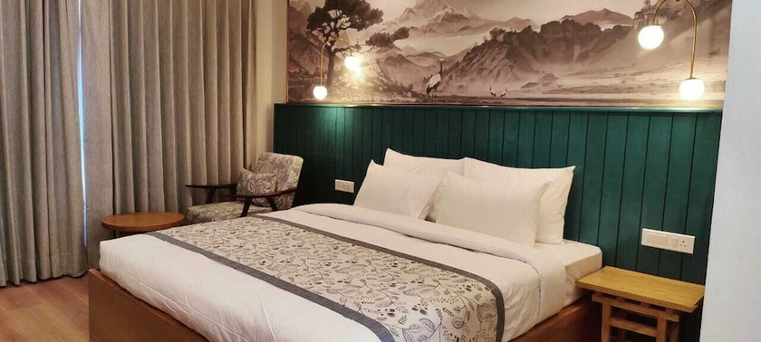 Imagen de la habitación del Hotel Zimskhang Villa. Foto 8