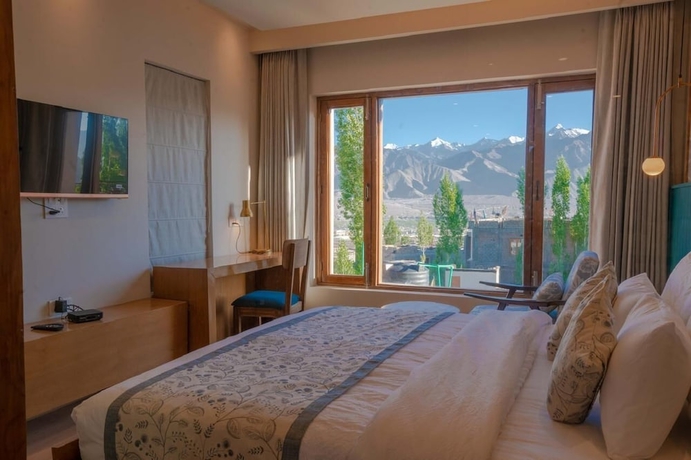 Imagen de la habitación del Hotel Zimskhang Villa. Foto 9