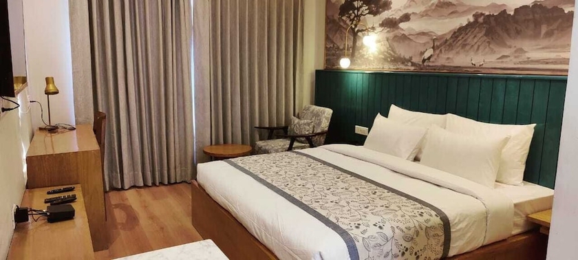 Imagen de la habitación del Hotel Zimskhang Villa. Foto 10