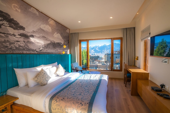Imagen de la habitación del Hotel Zimskhang Villa. Foto 11