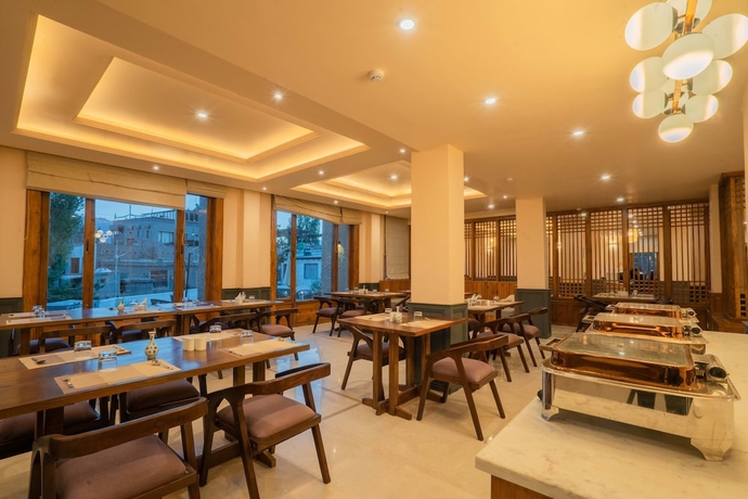 Imagen del bar/restaurante del Hotel Zimskhang Villa. Foto 6