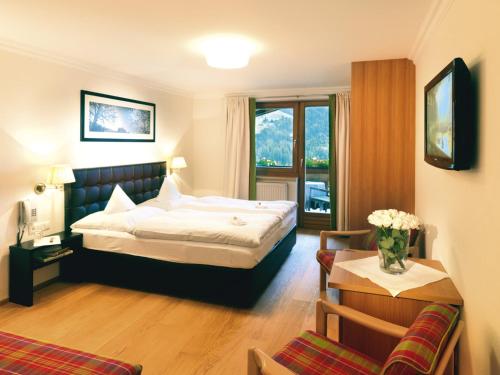 Imagen de la habitación del Hotel Zinnkr&uuml;gl. Foto 9