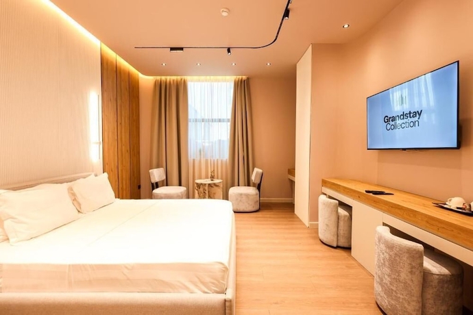 Imagen de la habitación del Hotel Zins Luxury Apartments. Foto 13
