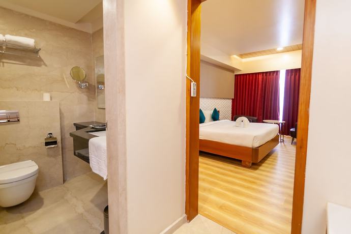 Imagen de la habitación del Hotel Zion A Luxurious Bangalore. Foto 8