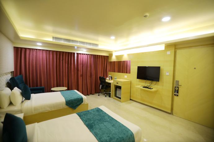 Imagen de la habitación del Hotel Zion A Luxurious Bangalore. Foto 12
