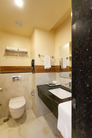 Imagen de la habitación del Hotel Zion A Luxurious Bangalore. Foto 13