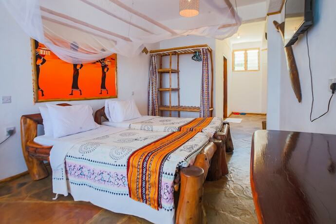 Imagen de la habitación del Hotel Ziwa Beach Resort. Foto 16