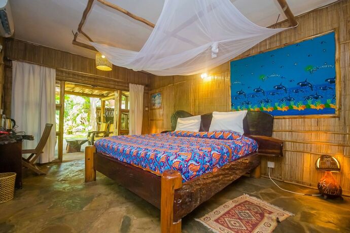 Imagen de la habitación del Hotel Ziwa Beach Resort. Foto 17