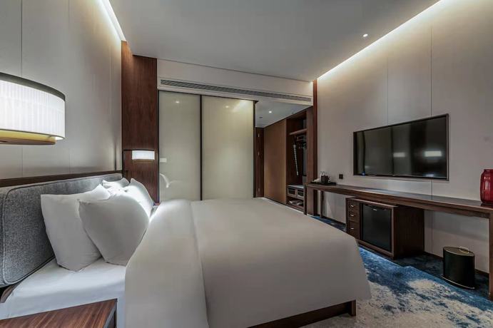 Imagen de la habitación del Hotel Ziyue Meixiu. Foto 5