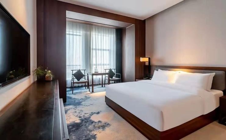 Imagen de la habitación del Hotel Ziyue Meixiu. Foto 16