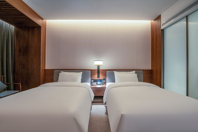 Imagen de la habitación del Hotel Ziyue Meixiu. Foto 17
