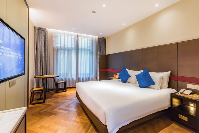 Imagen de la habitación del Hotel Ziyue Minghu. Foto 2