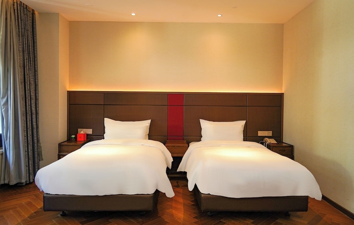 Imagen de la habitación del Hotel Ziyue Minghu. Foto 4