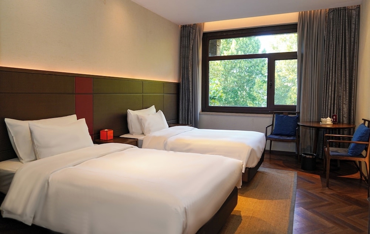 Imagen de la habitación del Hotel Ziyue Minghu. Foto 5