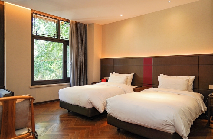 Imagen de la habitación del Hotel Ziyue Minghu. Foto 6