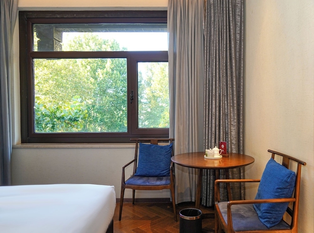 Imagen de la habitación del Hotel Ziyue Minghu. Foto 11