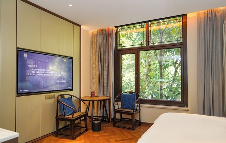 Imagen de la habitación del Hotel Ziyue Minghu. Foto 16