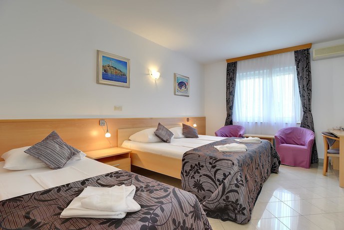 Imagen de la habitación del Hotel Zlatni rat Beach Resort. Foto 8